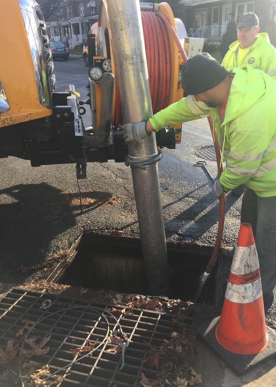 City employees pumping stormwater drain