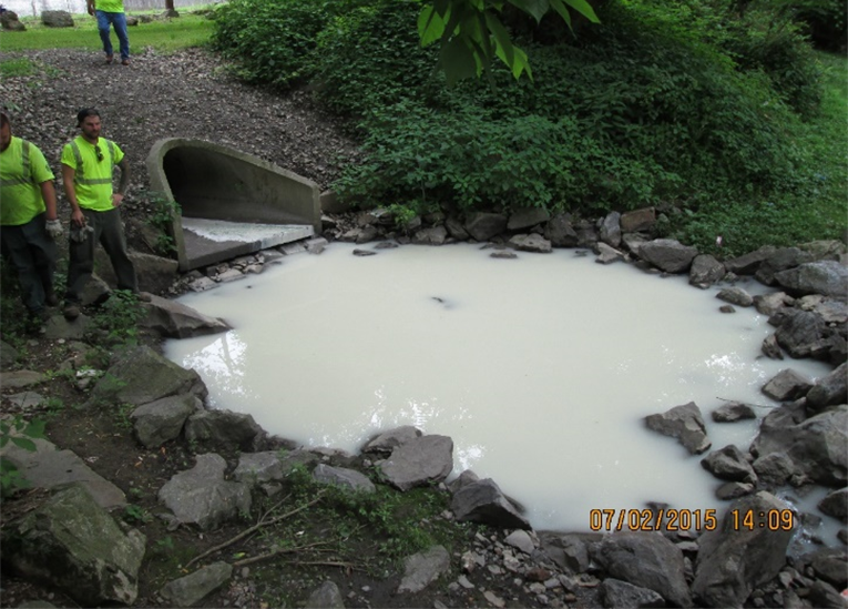 Polluted water at the exit of a stormwater outflow.