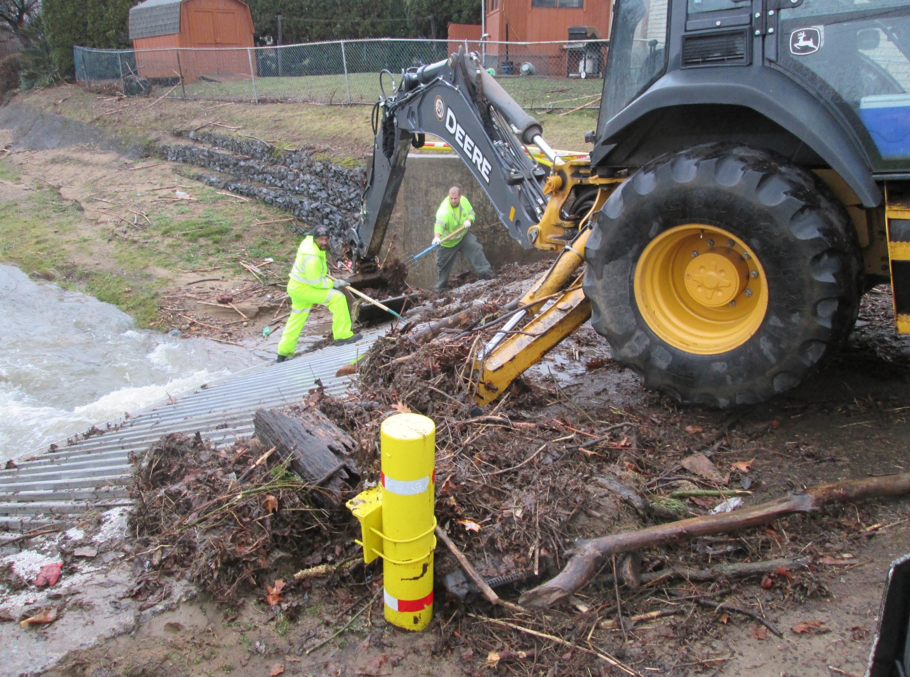 Workers clearing debris.